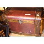 Wood and leather bound trunk, 64 x 36 x 46 cm with catch and side handles. Not available for in-