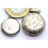 Two silver engraved circular lockets, D: 2 cm. 7.9g. P&P Group 1 (£14+VAT for the first lot and £1+