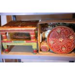 Two decorative prayer type stools and a box of decorative accessories. Not available for in-house