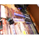 Box of DVDs and CDs to include The HUnger Games, Roots, Bruce Almighty etc. Not available for in-