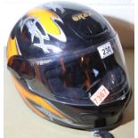 Grey motorcycle helmet. P&P Group 2 (£18+VAT for the first lot and £3+VAT for subsequent lots)