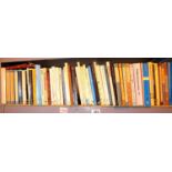 Shelf of paperback books including Penguin and Pelican. P&P Group 1 (£14+VAT for the first lot