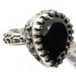 Heavy pewter black onyx set ring. Size P, 7.9g. P&P Group 1 (£14+VAT for the first lot and £1+VAT