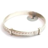 Silver vintage heart engraved adjustable baby bangle, stamped 925. P&P Group 1 (£14+VAT for the