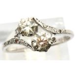Vintage 1920s 18ct white gold diamond engagement ring, the crossover set champagne coloured stones