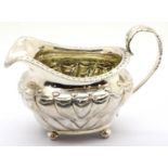 George VI hallmarked silver milk jug, London assay 1824, L: 15 cm, 201g. P&P Group 1 (£14+VAT for