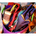 Round plastic basket of handbags and purses. Not available for in-house P&P, contact Paul O'Hea at
