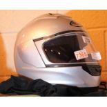 Suomy Trek motorcycle helmet and dustbag. Condition report: No sizes shown in or outside helmet P&