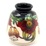 Moorcroft vase in the Anna Lily pattern, H: 8 cm. P&P Group 1 (£14+VAT for the first lot and £1+