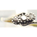 Ladies vintage 18ct gold and platinum fancy three stone diamond ring, size K, 2.5g. P&P Group 1 (£