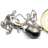 Contemporary Baroque pearl and stone set silver pendant on a silver chain. Pendant L: 2 cm, chain L: