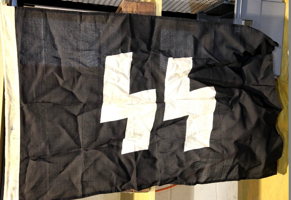 German WWII type SS flag bearing stamps and dated 1942, 90 x 60 cm. P&P Group 1 (£14+VAT for the