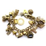 9ct gold charm bracelet with 23 charms, 107.3g. P&P Group 1 (£14+VAT for the first lot and £1+VAT