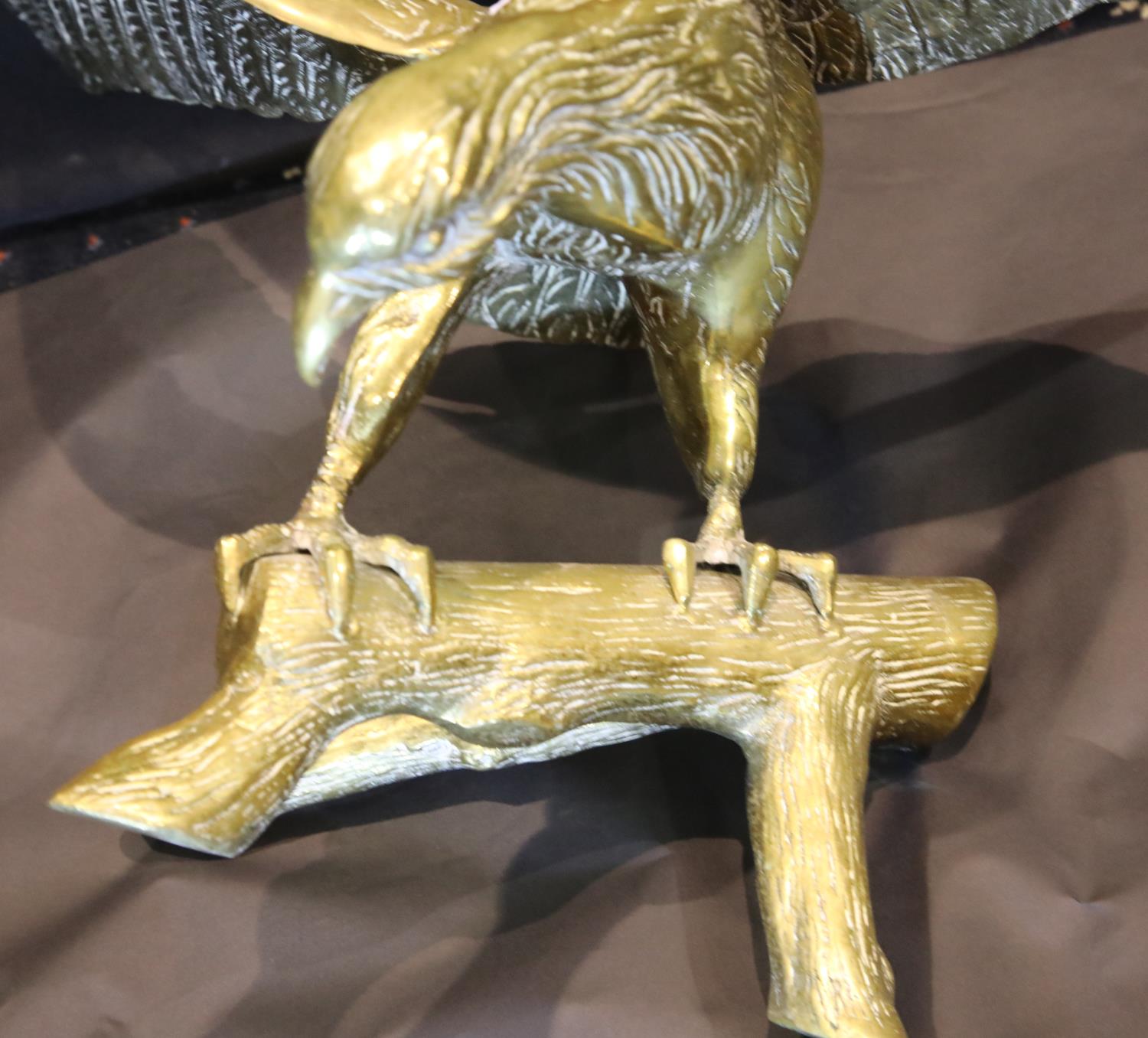 Large brass eagle perched on a rock, wingspan: 65 cm. P&P Group 3 (£25+VAT for the first lot and £ - Image 4 of 7