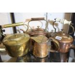 Two copper kettles, jug and a brass kettle. P&P Group 3 (£25+VAT for the first lot and £5+VAT for