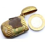 Victorian brass and leather vesta case, L: 4 cm. P&P Group 1 (£14+VAT for the first lot and £1+VAT