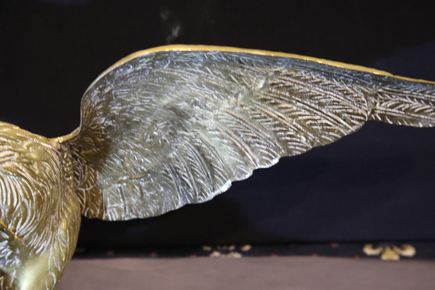Large brass eagle perched on a rock, wingspan: 65 cm. P&P Group 3 (£25+VAT for the first lot and £ - Image 7 of 7