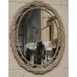 Large oval bleached wood framed mirror, H: 90 cm. Not available for in-house P&P, contact Paul O'Hea