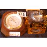 Cased barometer and resin encased cigarette lighter. P&P Group 2 (£18+VAT for the first lot and £3+