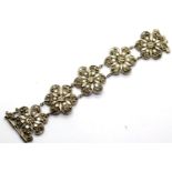 White metal filigree bracelet, probably silver, 30g. P&P Group 1 (£14+VAT for the first lot and £1+