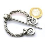 White metal Norse type penannular cloak pin. P&P Group 1 (£14+VAT for the first lot and £1+VAT for