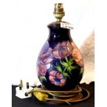 Moorcroft blue ground Anemone lamp base, H: 26 cm. P&P Group 2 (£18+VAT for the first lot and £3+VAT