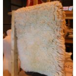Sheepskin rug, L: 95 cm. Not available for in-house P&P, contact Paul O'Hea at Mailboxes on 01925