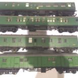 Four Hornby/Triang green coaches/parcels in very good condition and unboxed. P&P Group 1 (£14+VAT