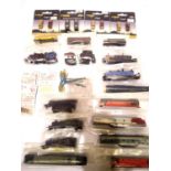 N gauge body shells diesel and steam x9, narrow boats x2, lamps, huts, rail joiners, buses x3,