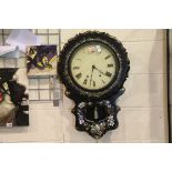 Victorian papier mache mother of pearl and painted clock with key and pendulum. Not available for