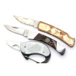 Three Buck folding knives (blade lengths 4-5 cm) P&P Group 2 (£18+VAT for the first lot and £3+VAT