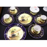 Noritake part tea set including four trios in the Desert Scene pattern. Not available for in-house