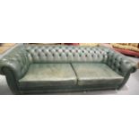 Very large green leather buttoned back Chesterfield sofa, L: 280 cm. Not available for in-house P&P,