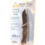 Black Tac first production run folding knife, blade L: 9 cm. P&P Group 2 (£18+VAT for the first