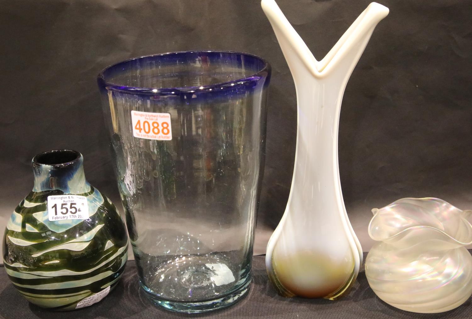 Four studio glass vases. P&P Group 3 (£25+VAT for the first lot and £5+VAT for subsequent lots)