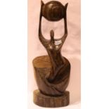 Continental hardwood carving of a figure holding a ball, signed Ruth Lea, H: 60 cm. P&P Group 3 (£