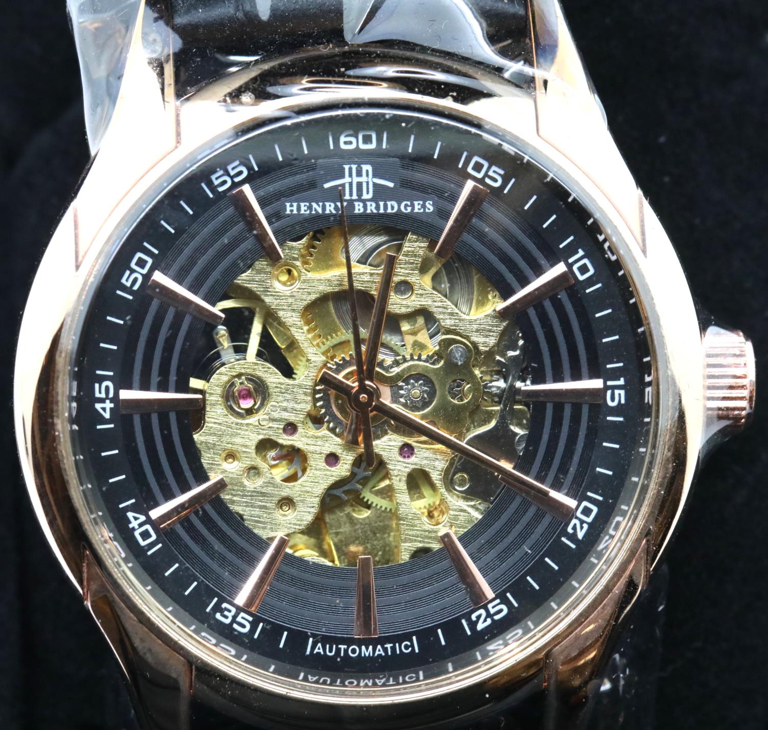 Henry Bridges new and boxed gents skeleton wristwatch on a leather strap. P&P Group 1 (£14+VAT for
