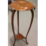 Victorian mahogany plant stand on three shaped legs with under tier, H: 95 cm. Not available for