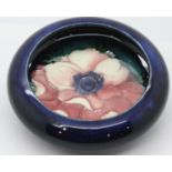 Moorcroft Blue ground Anemone lidded bowl. P&P Group 2 (£18+VAT for the first lot and £3+VAT for