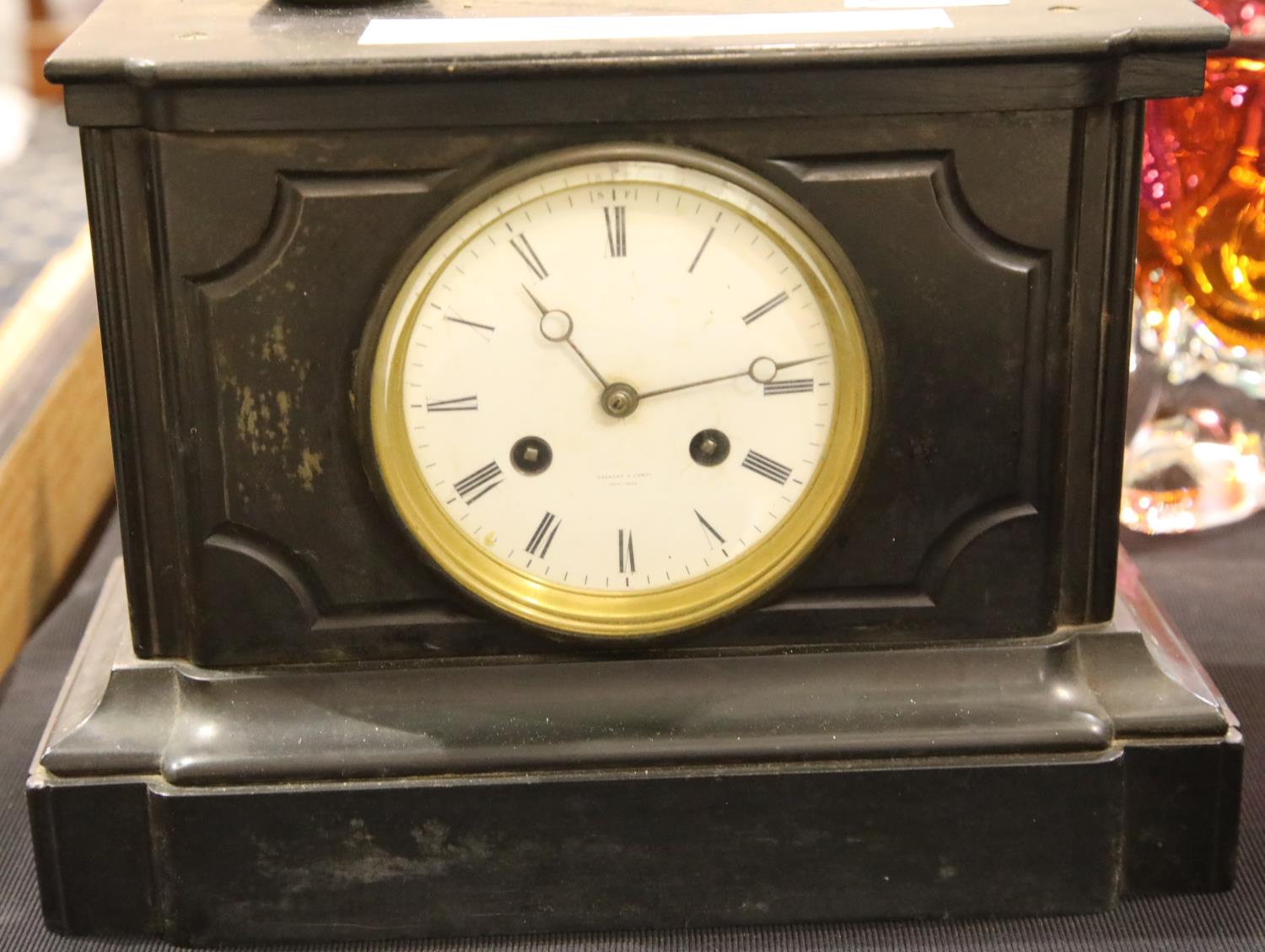 Slate mantel clock face marked Tiffany and company New York with pendulum. Loose top not striking