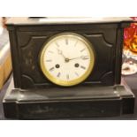 Slate mantel clock face marked Tiffany and company New York with pendulum. Loose top not striking