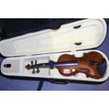 Half sized student violin with case. P&P Group 3 (£25+VAT for the first lot and £5+VAT for