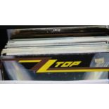 Box of mixed lp records including ZZ Top, Simply Red etc. Not available for in-house P&P, contact