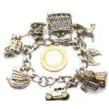 Silver charm bracelet with 8 charms, 44g. P&P Group 1 (£14+VAT for the first lot and £1+VAT for