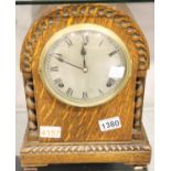 Gilbert mantel clock with barley twist pillars and case pen key and pendulum. Not available for in-