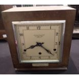 Square cased Goldsmiths and Silversmiths Westminster chimes mantel clock with pendulum and key. P&
