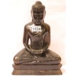 Eastern carved hardwood model of a seated Guan Yin figure, H: 35 cm. P&P Group 3 (£25+VAT for the