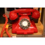 Red GPO Carrington, push button telephone in 1920s styling with pull-out pad tray; compatible with