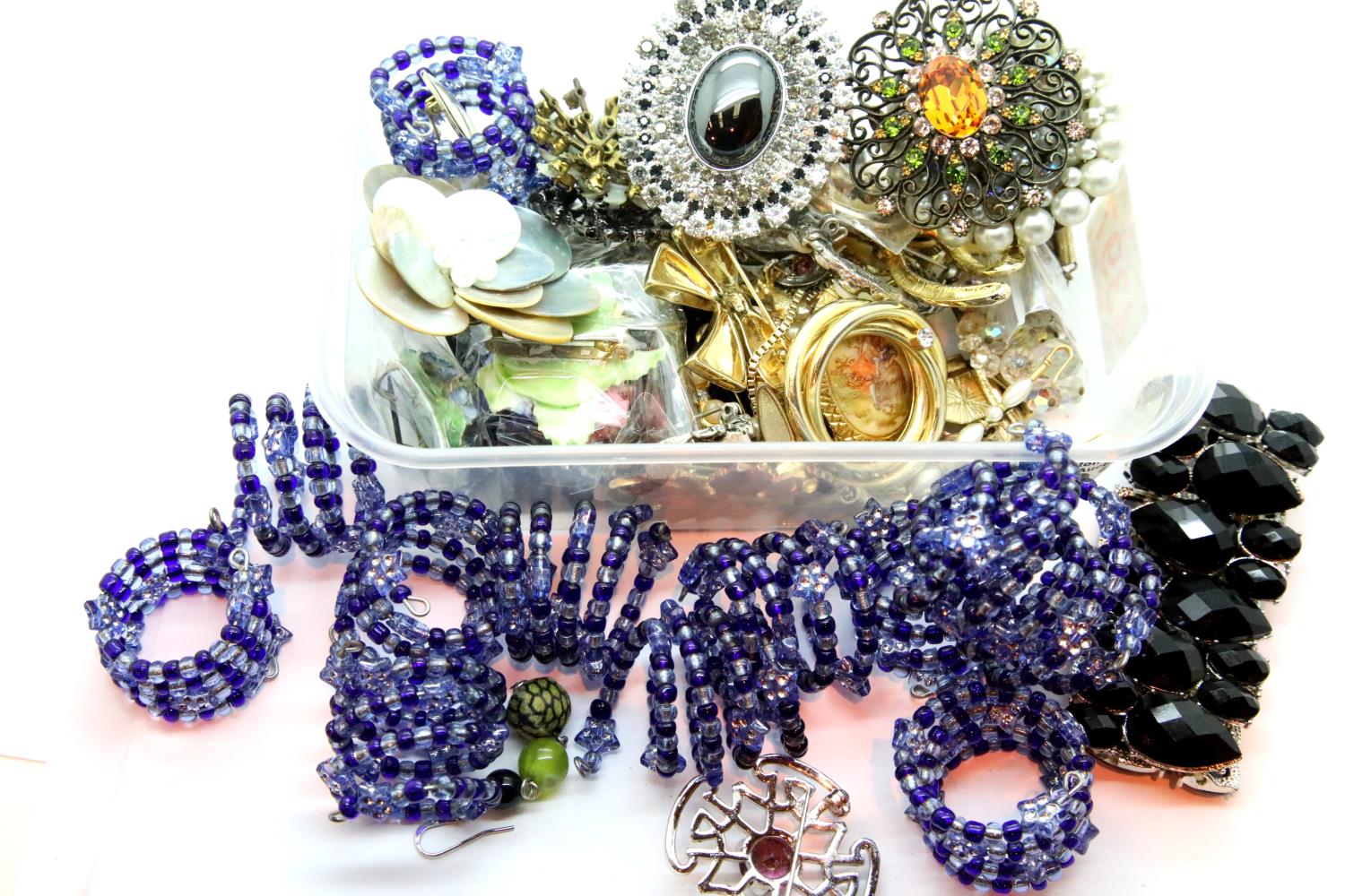 Quantity of ladies costume brooches and bangles. Not available for in-house P&P, contact Paul O'