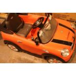 Child's electric Mini Cooper with charger. Not available for in-house P&P, contact Paul O'Hea at